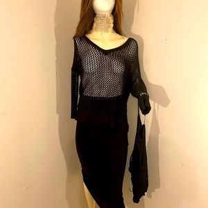 Rock and republic mesh top. On the back it has a skull sewn on.